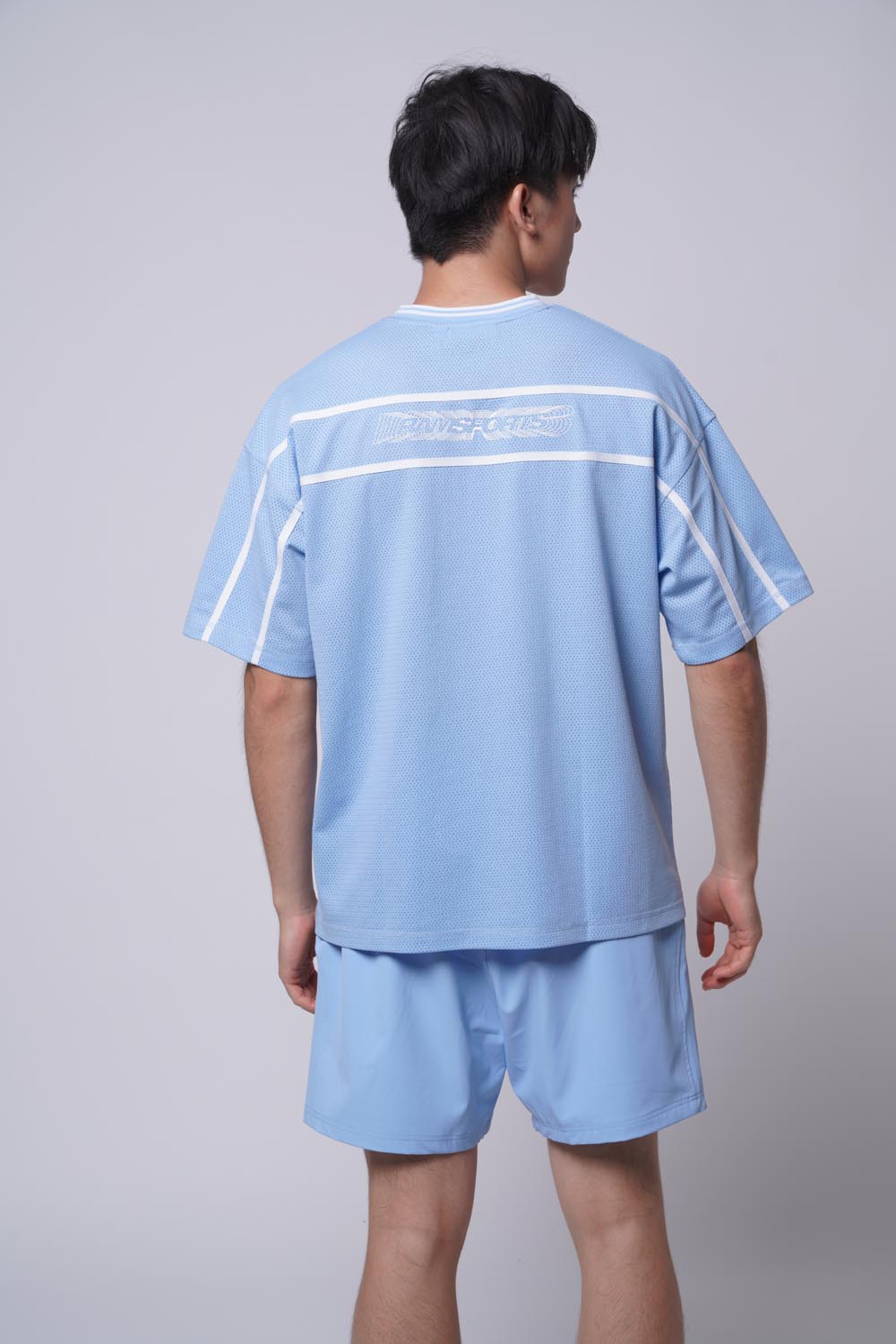 Back view of Male model wearing of Ramsports MatchDay Core Short in blue