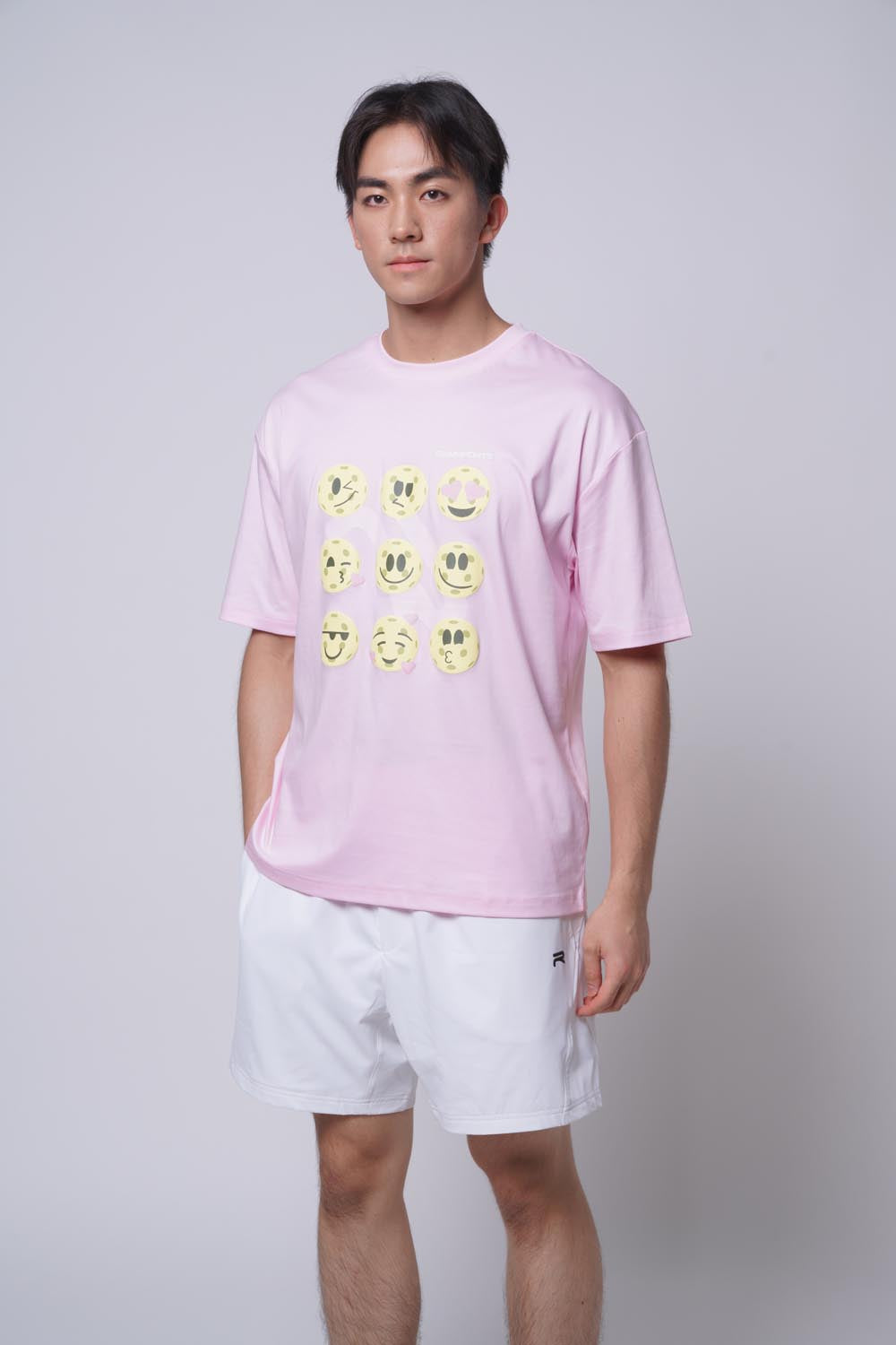 Asian male model wearing Ramsports Court Moods Icon Grid T-shirt in pink