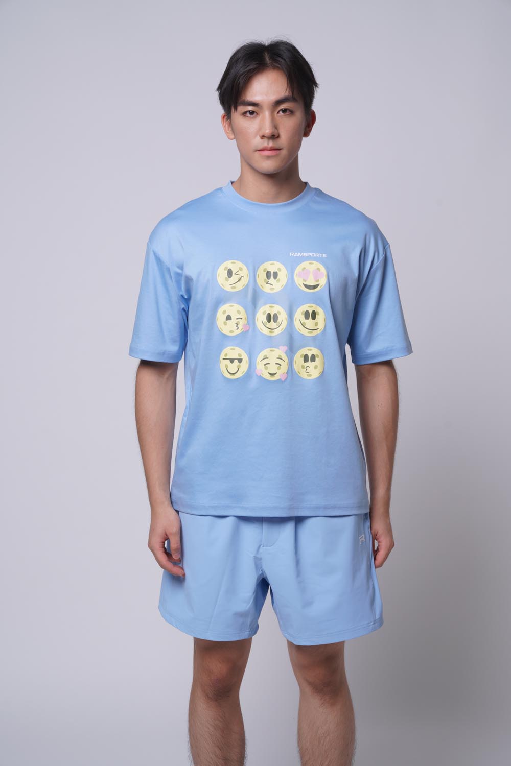 Asian male model wearing Ramsports Court Moods Icon Grid T-shirt in blue