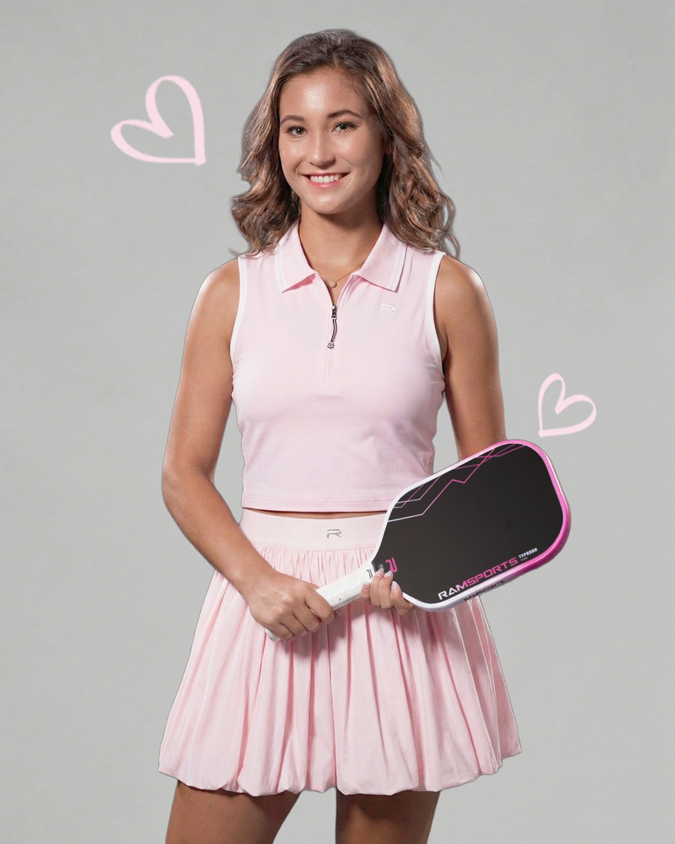 Roos Van Reek holding the limited edition Typhoon Gen 3 Precision Power in Pink