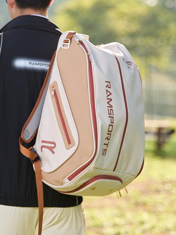 Cropped side view of a male model wearing the Ramsports Heritage DuoTone Backpack, with focus on the bag